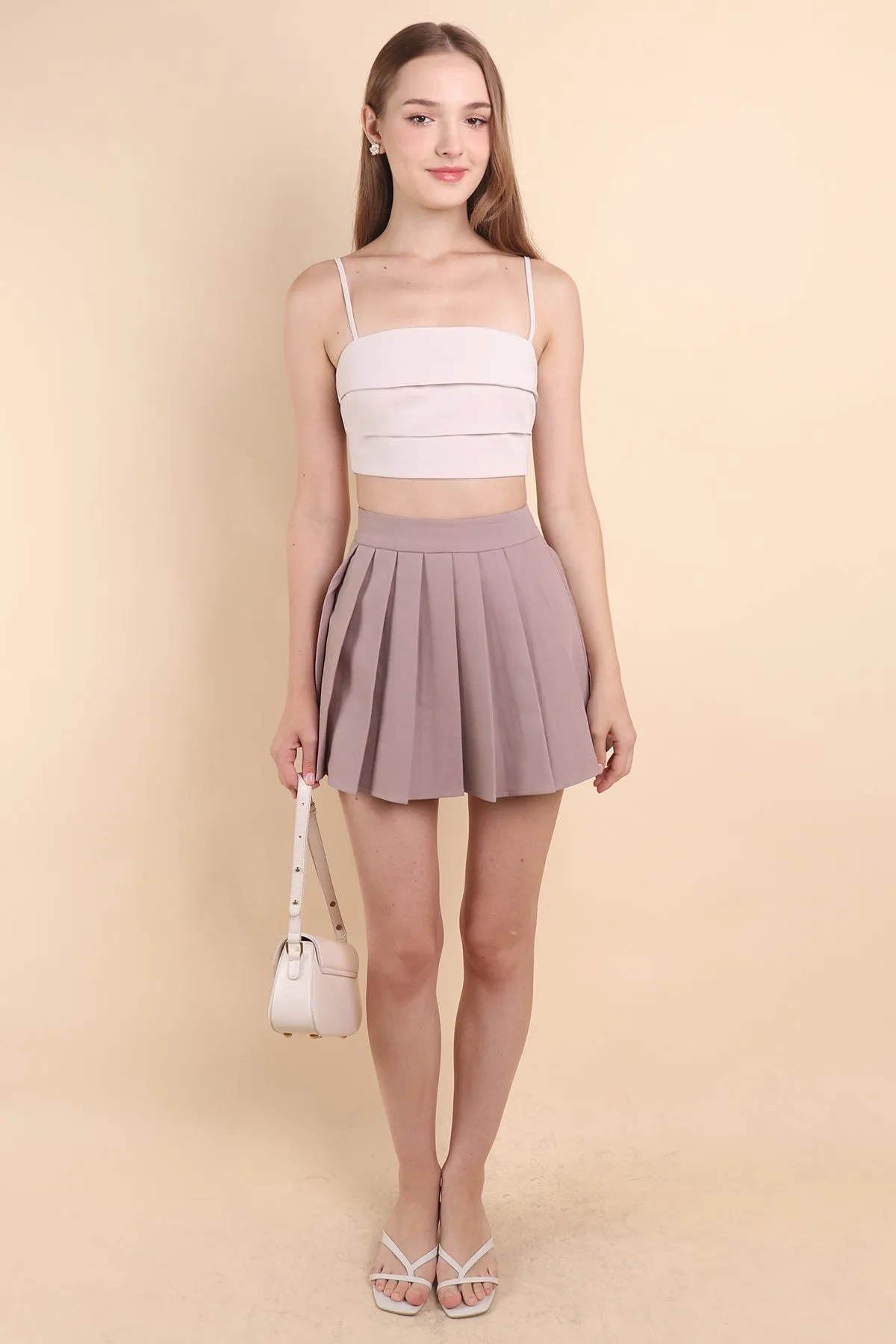 CAMU PLEATED SKIRT IN MAUVE